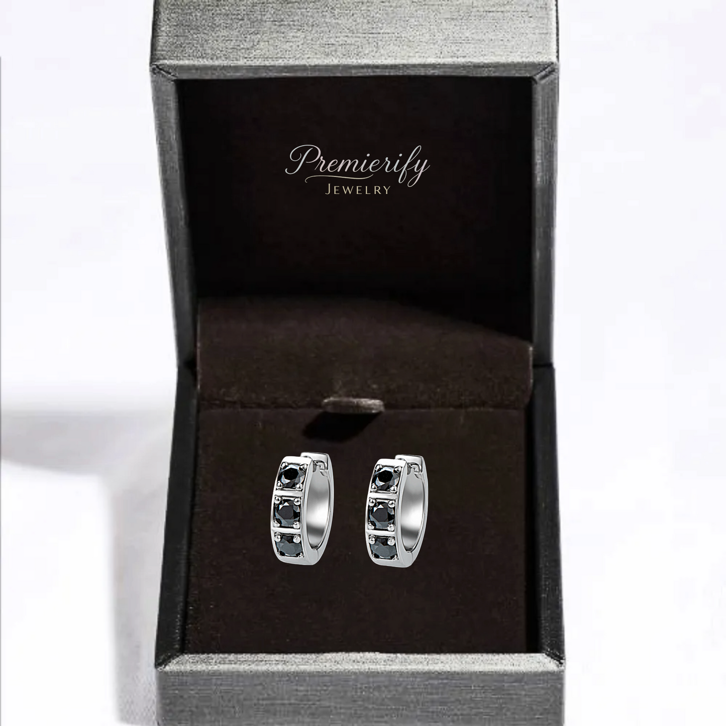 Silver hoop earrings with black stones in a 'Premierify Jewelry' box.