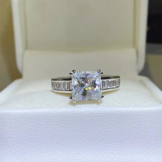 Aveline™ 3 carat princess cut moissanite ring with baguette side stones set in platinum-plated 925 sterling silver