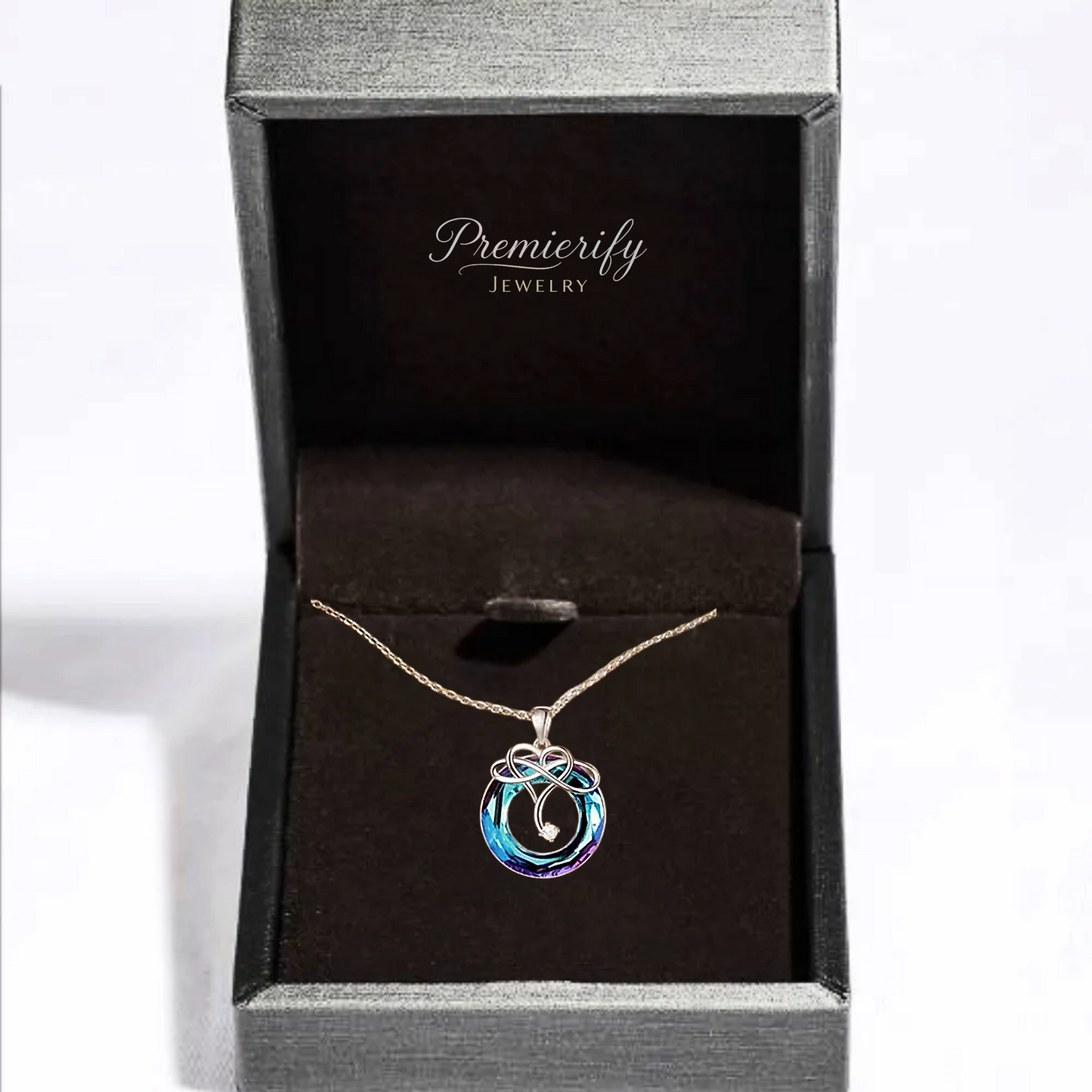 Necklace with a blue pendant in a 'Premierify Jewelry' box