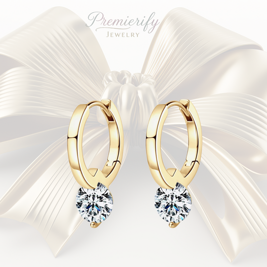 Gold hoop earrings with clear gemstones on a white background, featuring the brand 'Premierify Jewelry'.