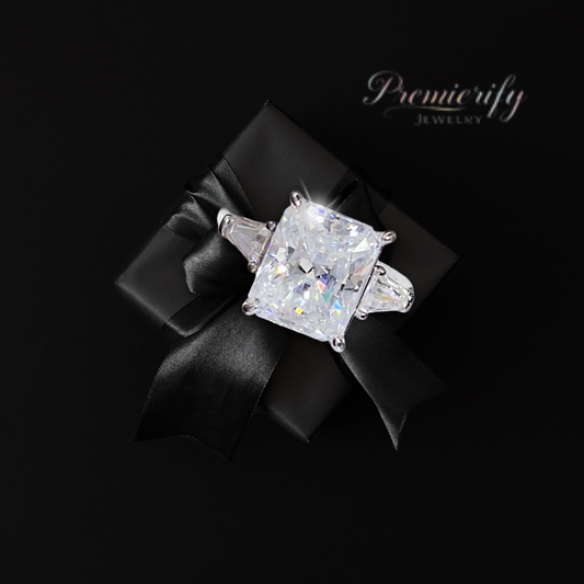 Diamond ring on a black bow with 'Premierify Jewelry' branding