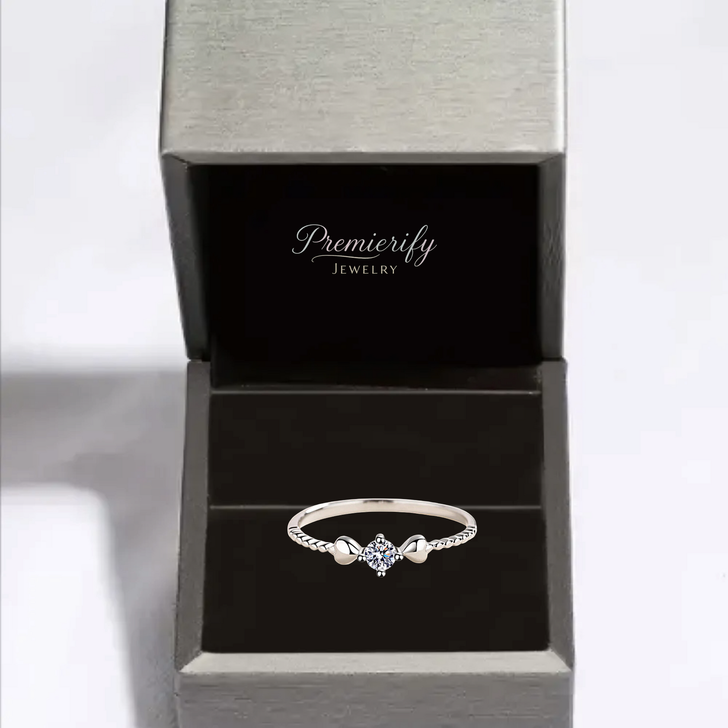 Silver ring with a diamond in a Premierify Jewelry box