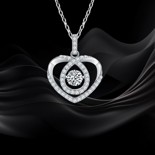 Heart-shaped diamond pendant on a black fabric background