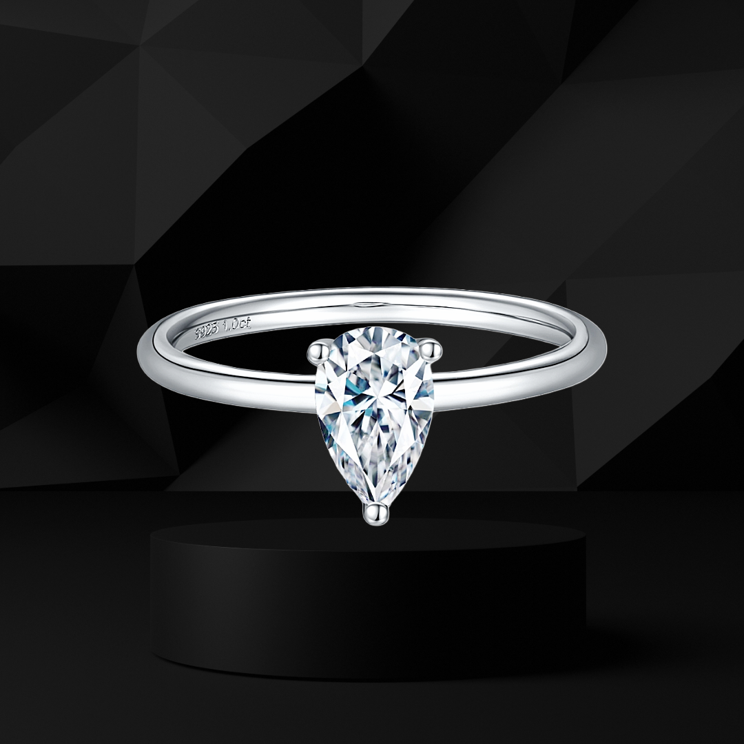 Premierify™ 1 ct moissanite engagement ring in pear cut, platinum-plated 925 sterling silver.