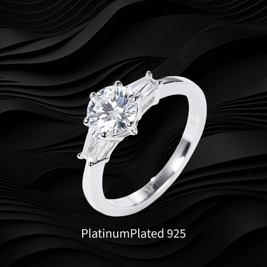 Platinum-plated ring with a diamond on a black wavy background