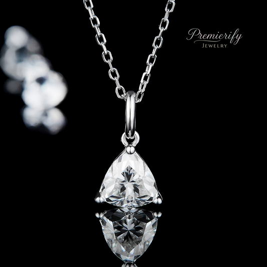 Silver pendant necklace with a clear gemstone on a black background, branded 'Premierify Jewelry'.