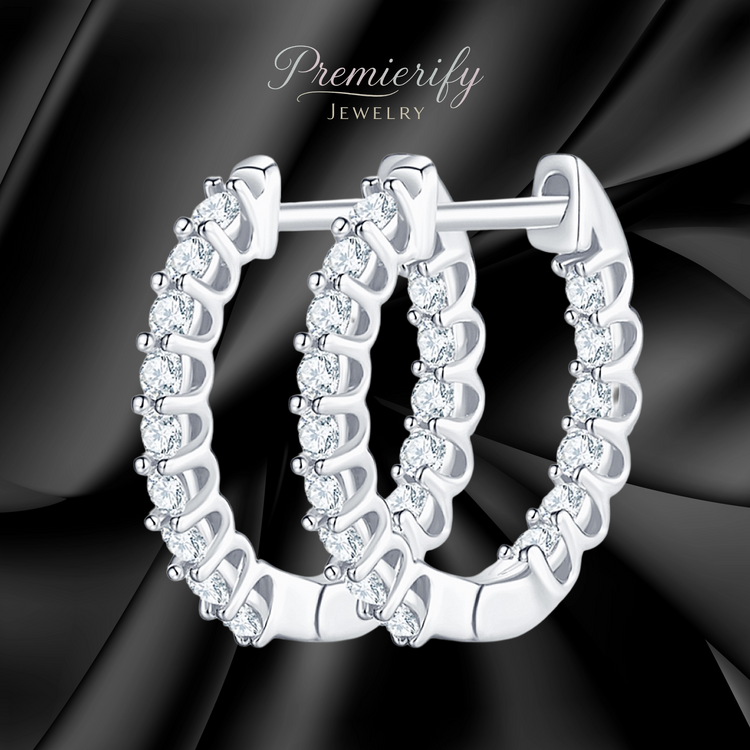 Premierify Jewelry silver moissanite hoop earrings on black background.