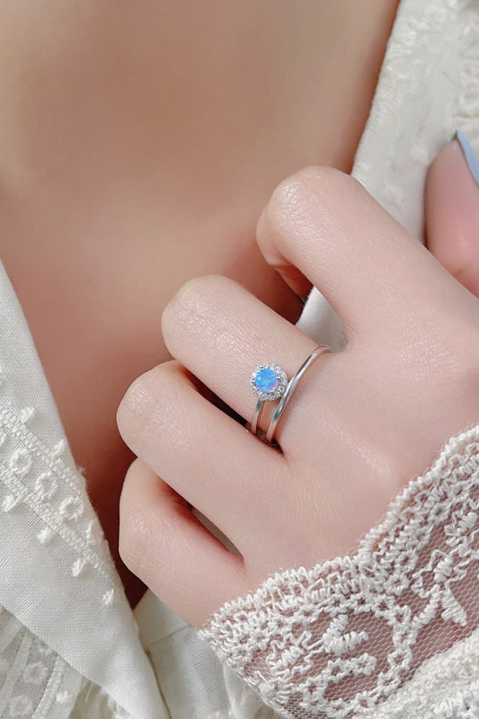 Close-up of a white opal solitaire ring in platinum-plated 925 sterling.