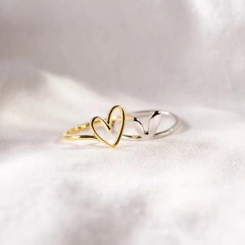 Vibe Heart™ asymmetric open-heart double-band ring in 925 sterling silver.