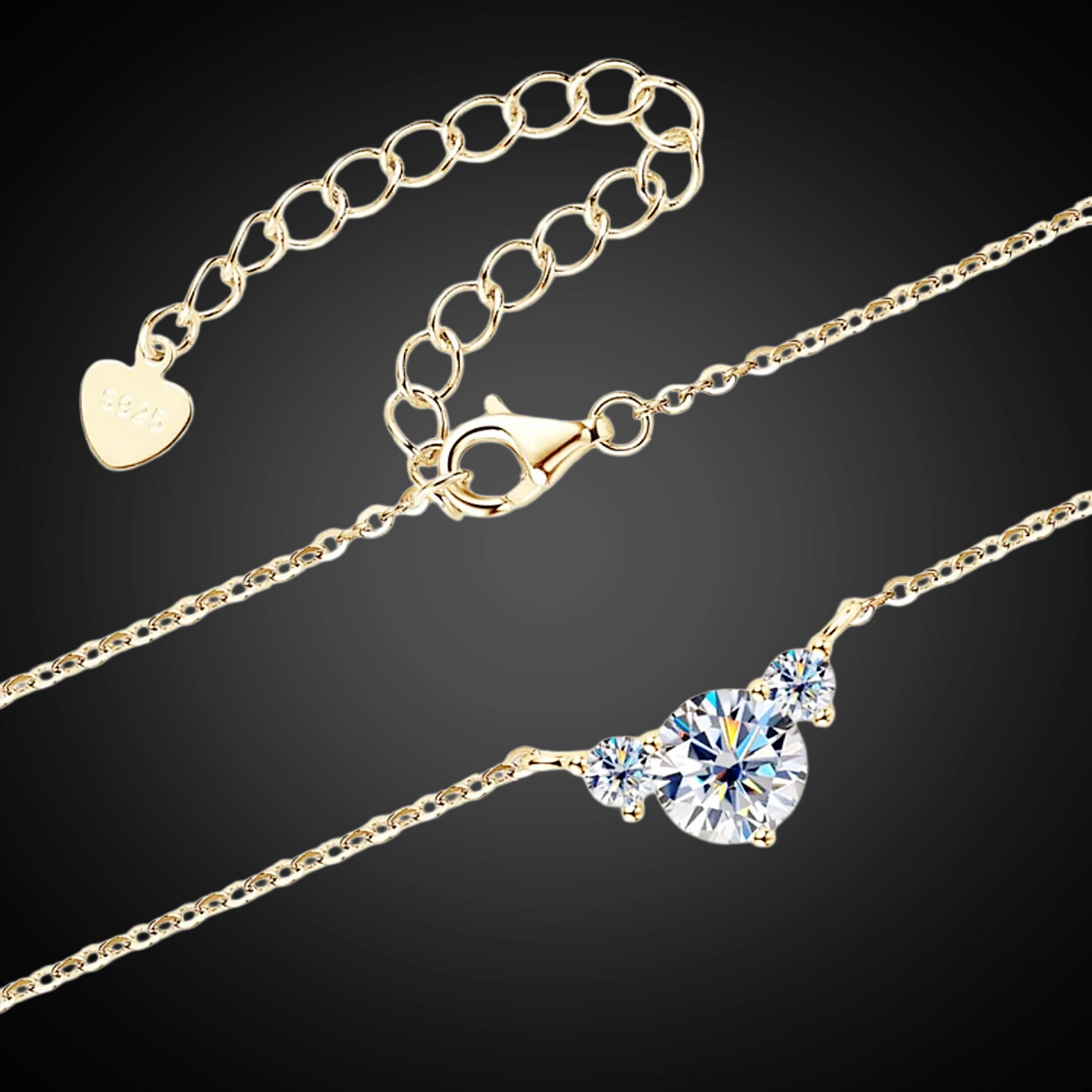 Gold necklace with a heart-shaped pendant on a black background