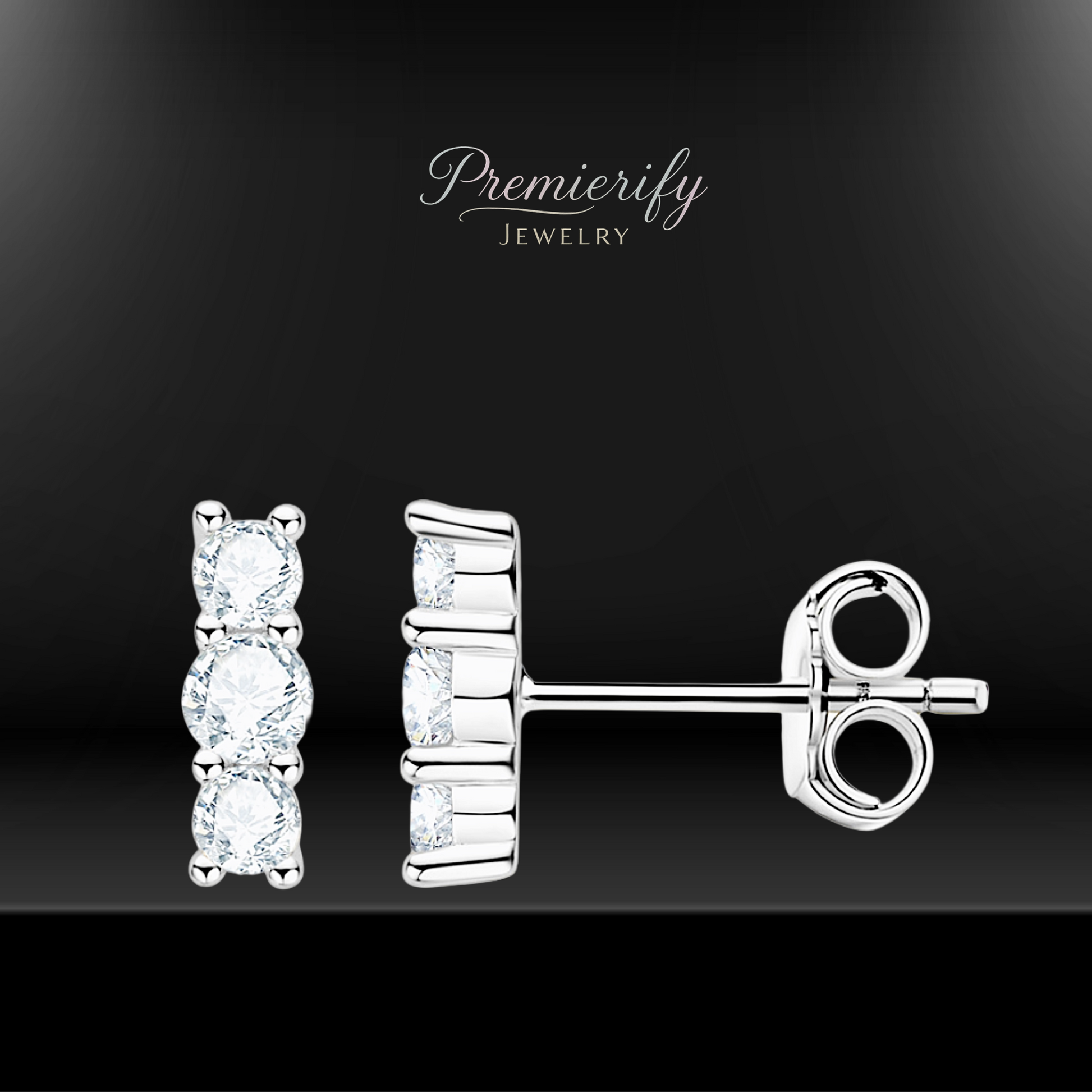 Silver earrings with clear gemstones on a black background, featuring the brand 'Premierify Jewelry'.