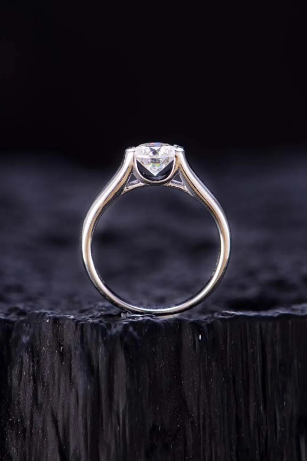 "Axisline™ 1.5 carat bezel-set moissanite."