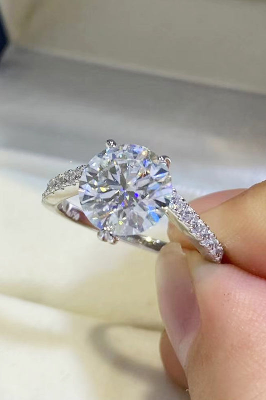Pure Fire™ 3ct moissanite ring in platinum-plated 925 sterling with zircon accents; includes a certificate of authentication.