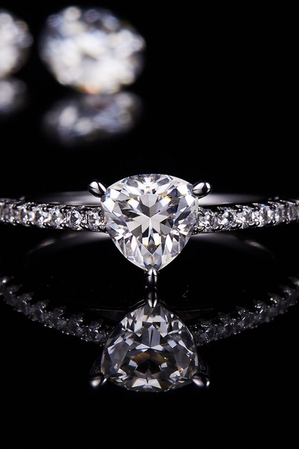 TriNova™ 1ct triangle moissanite ring in platinum-plated 925 with zircon accents; includes certificate of authentication.