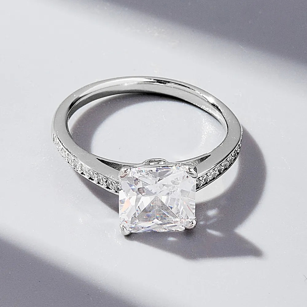 Radiant-cut zircon ring in platinum-plated 925 sterling silver, front angle view