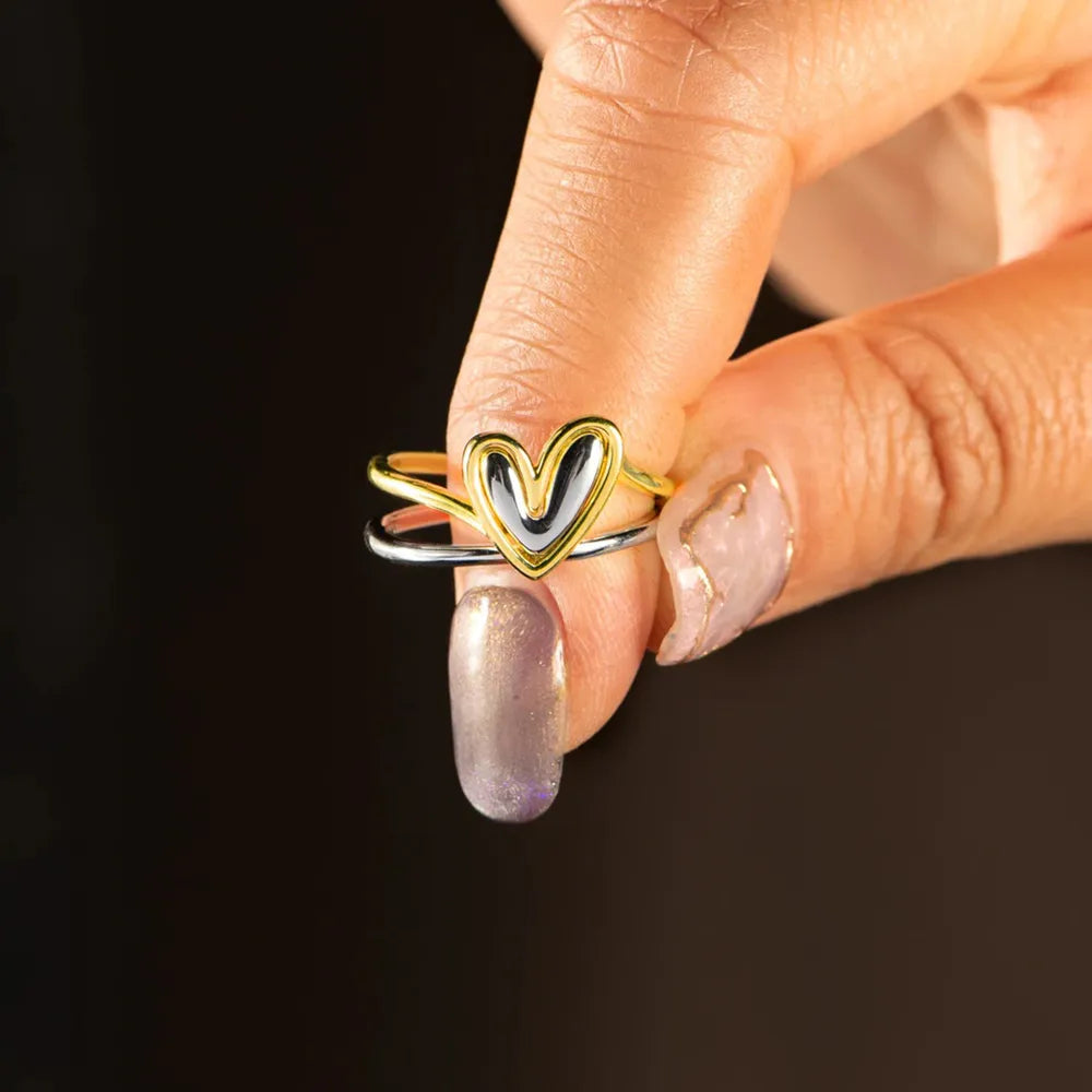 Vibe Heart™ asymmetric open-heart double-band ring in 925 sterling silver.