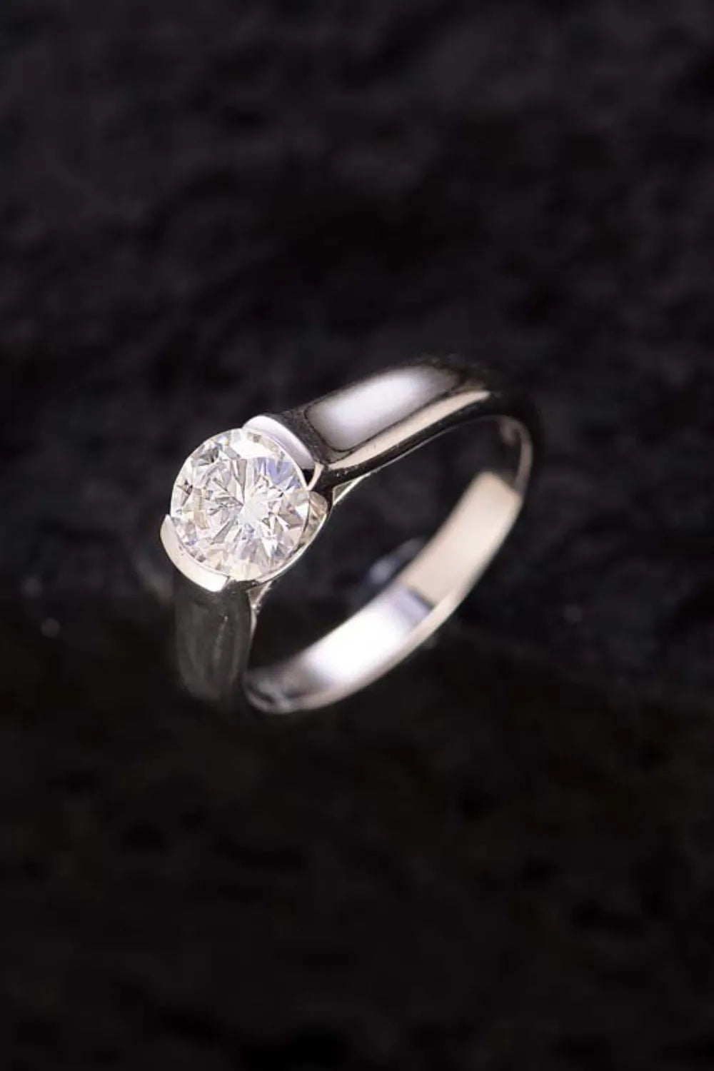 "Axisline™ 1.5 carat bezel-set moissanite solitaire ring in polished 925 sterling silver, modern architectural design."