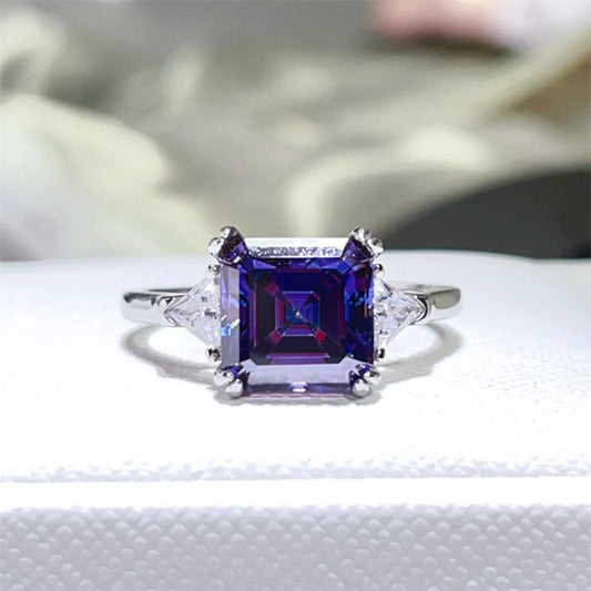 Premierify™ Veloura ring – 3-carat violet radiant-cut moissanite in platinum-plated 925 sterling silver with trillion-cut zircon side stones
