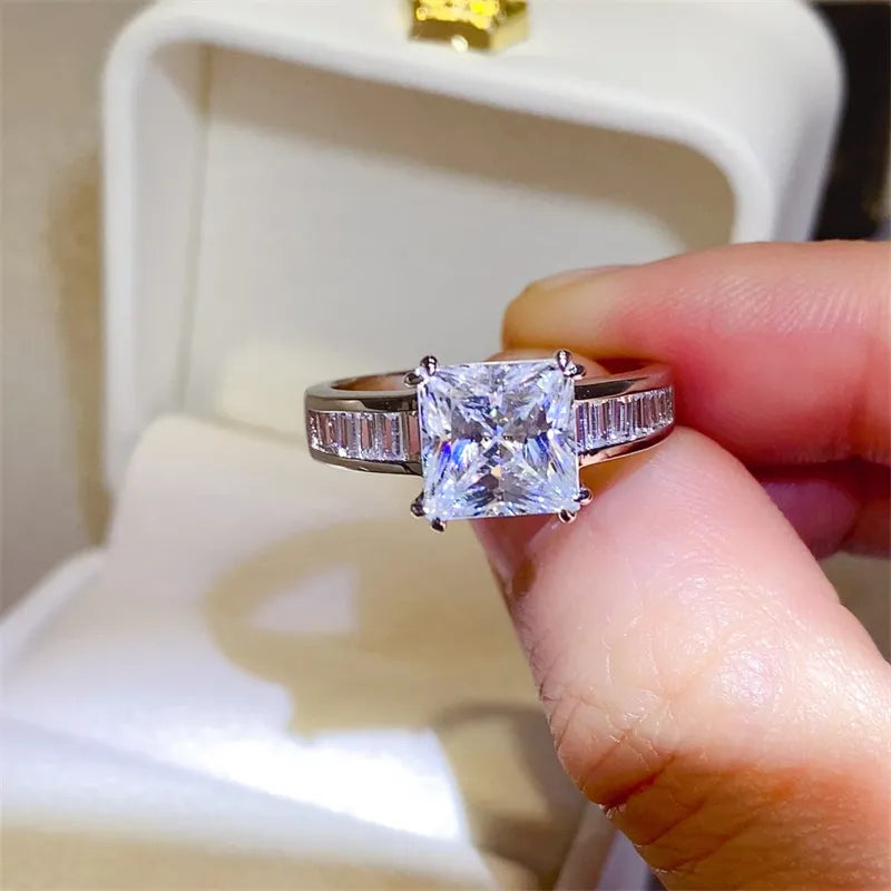 Aveline™ 3 carat princess cut moissanite ring with baguette side stones set in platinum-plated 925 sterling silver