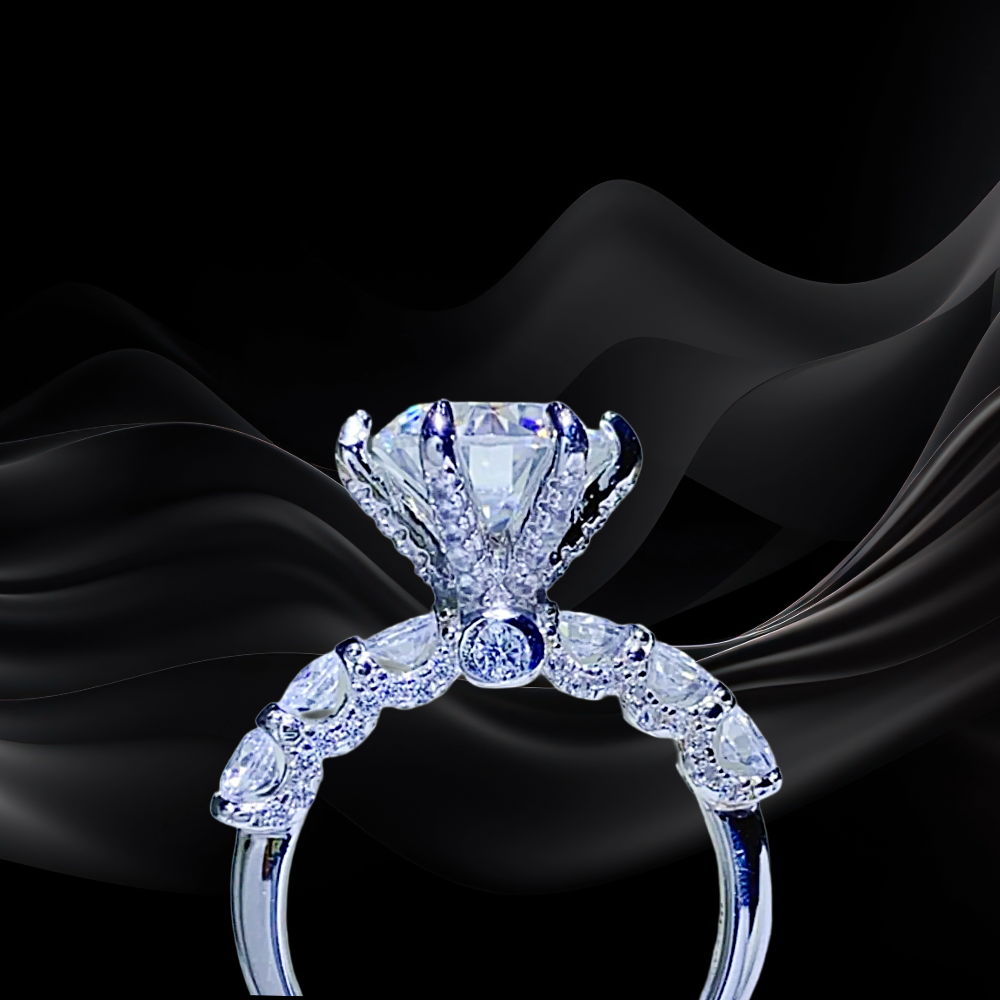 Diamond ring on a black fabric background