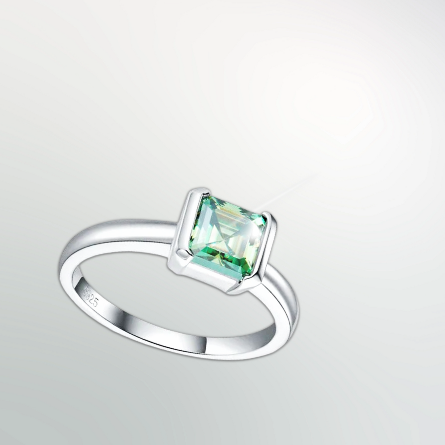 Astra Verde™ sea-glass green asscher-cut moissanite ring in platinum-plated sterling silver, angled view