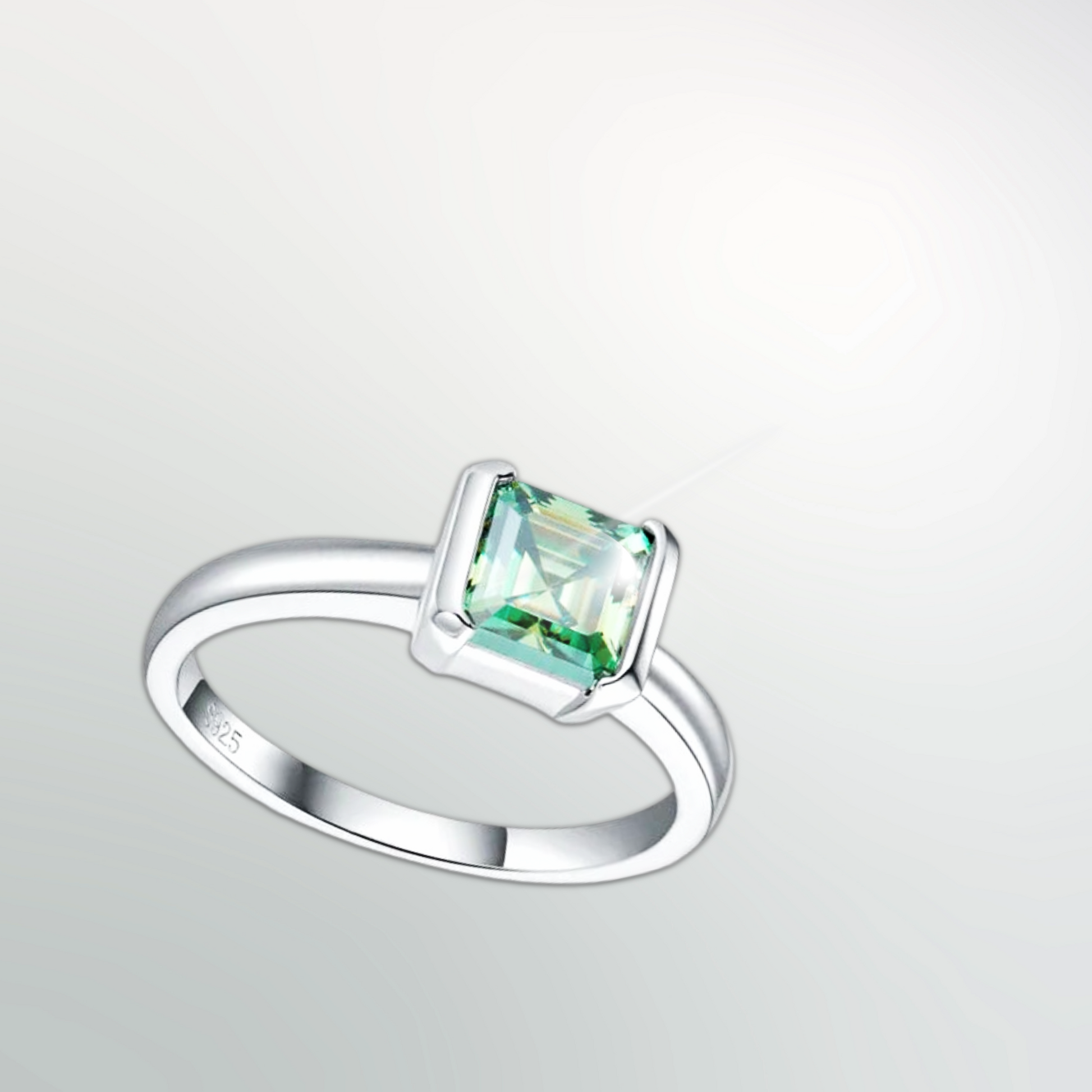 Astra Verde™ sea-glass green asscher-cut moissanite ring in platinum-plated sterling silver, angled view