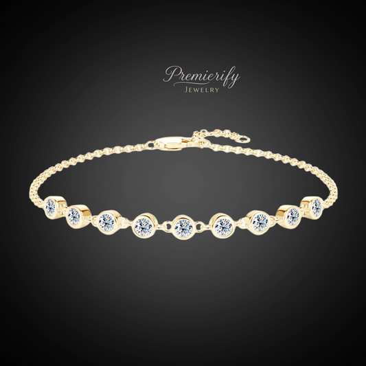 Gold bracelet with diamonds on a dark background, featuring the brand 'Premierify Jewelry'.