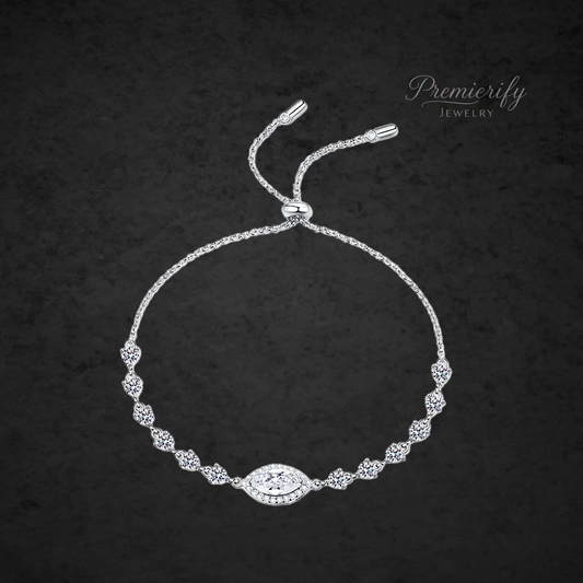 Silver bracelet with decorative elements on a dark background, featuring the brand 'Premierify Jewelry'.