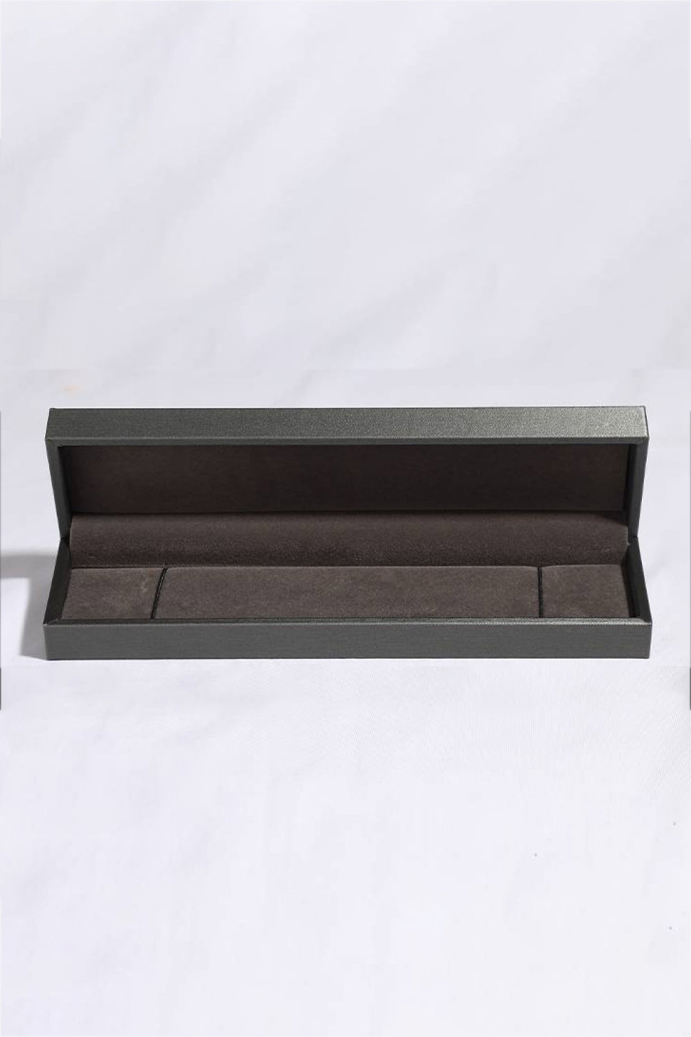 Jewelry box on gray background.