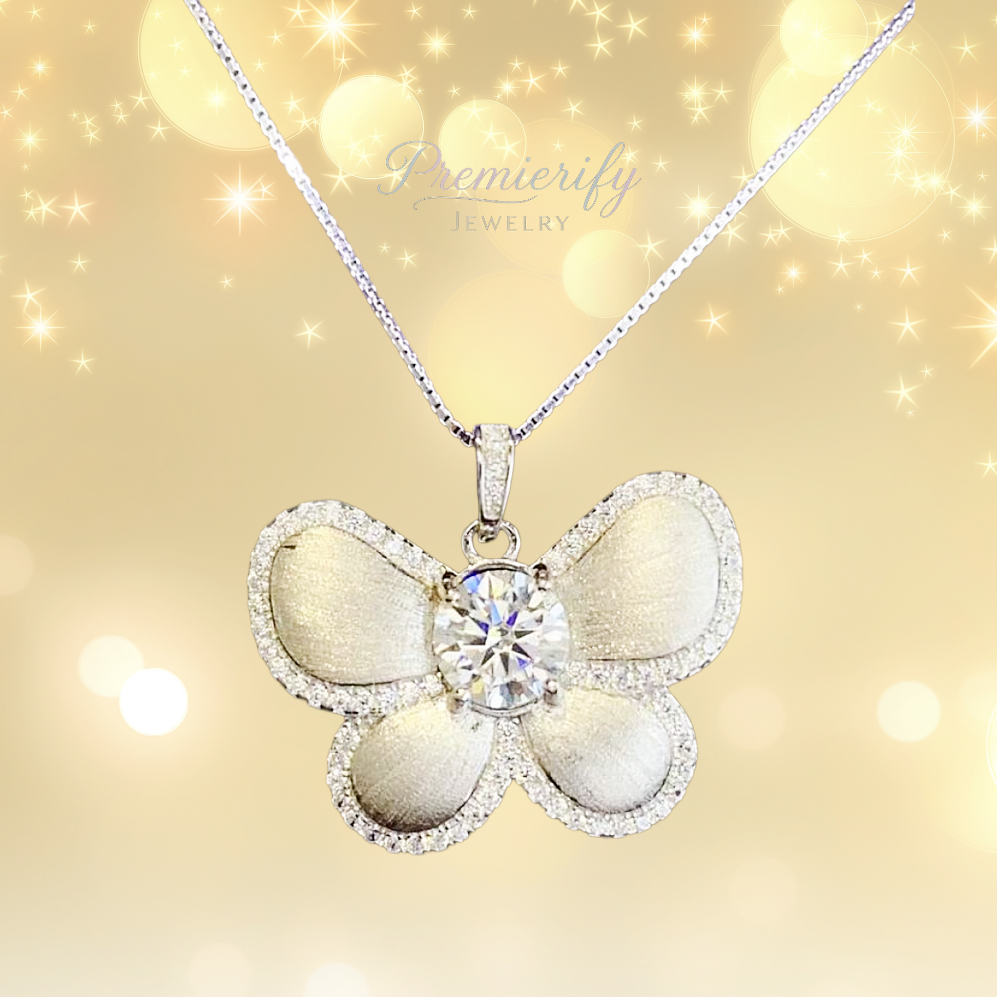 Butterfly-shaped pendant necklace with a sparkling gemstone on a gold background, featuring the brand 'Premierify Jewelry'.