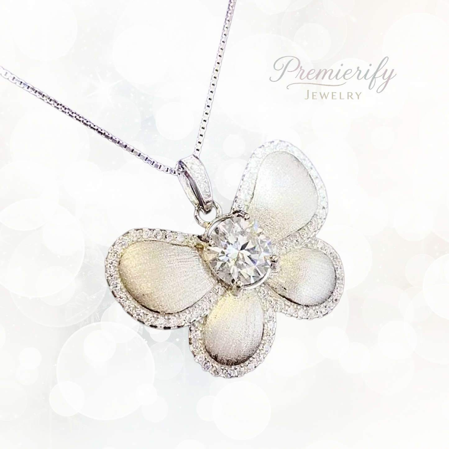 Butterfly-shaped pendant with a diamond on a white background, branded 'Premierify Jewelry'.
