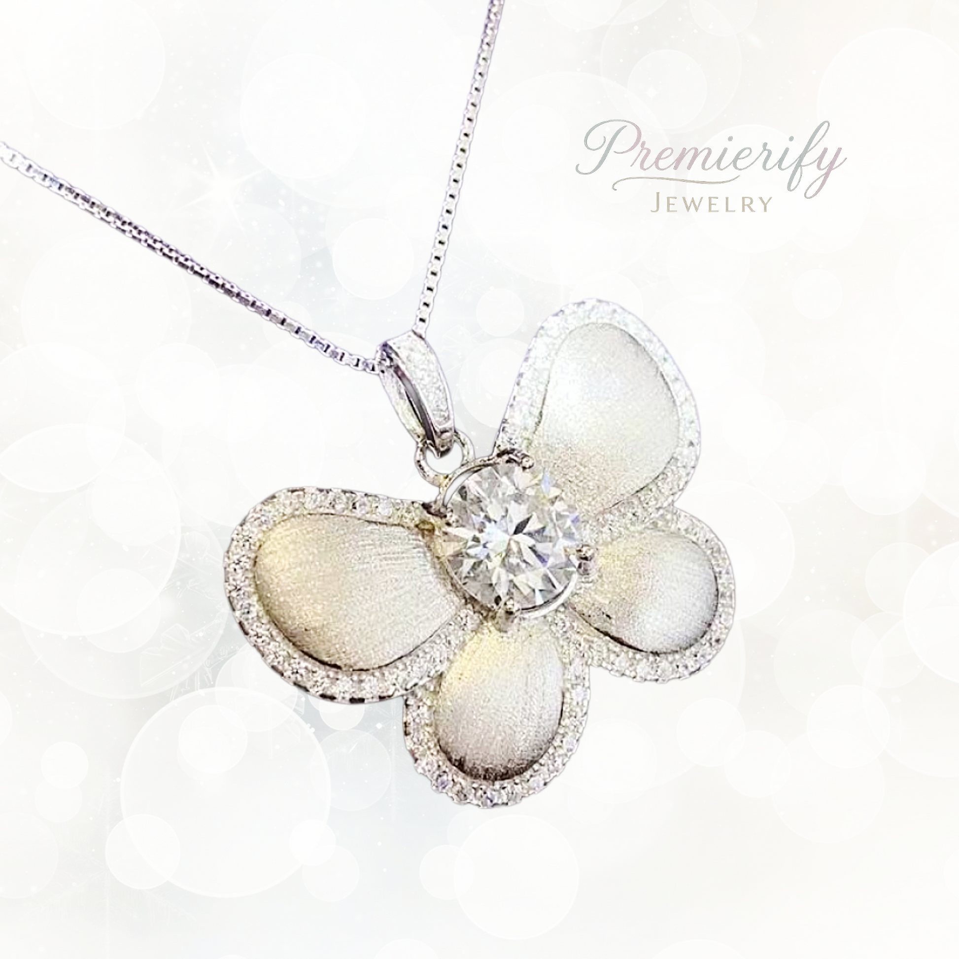 Butterfly-shaped pendant with a diamond on a white background, branded 'Premierify Jewelry'.