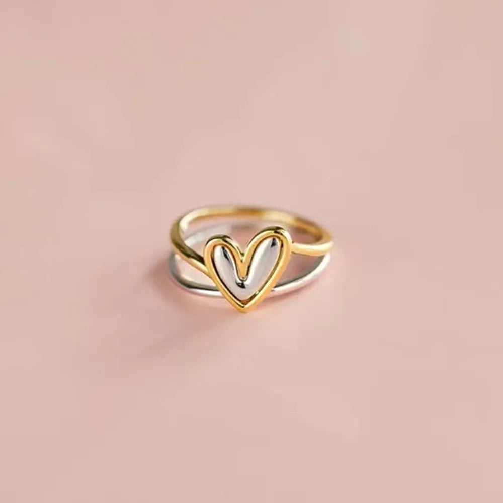 Vibe Heart™ asymmetric open-heart double-band ring in 925 sterling silver.