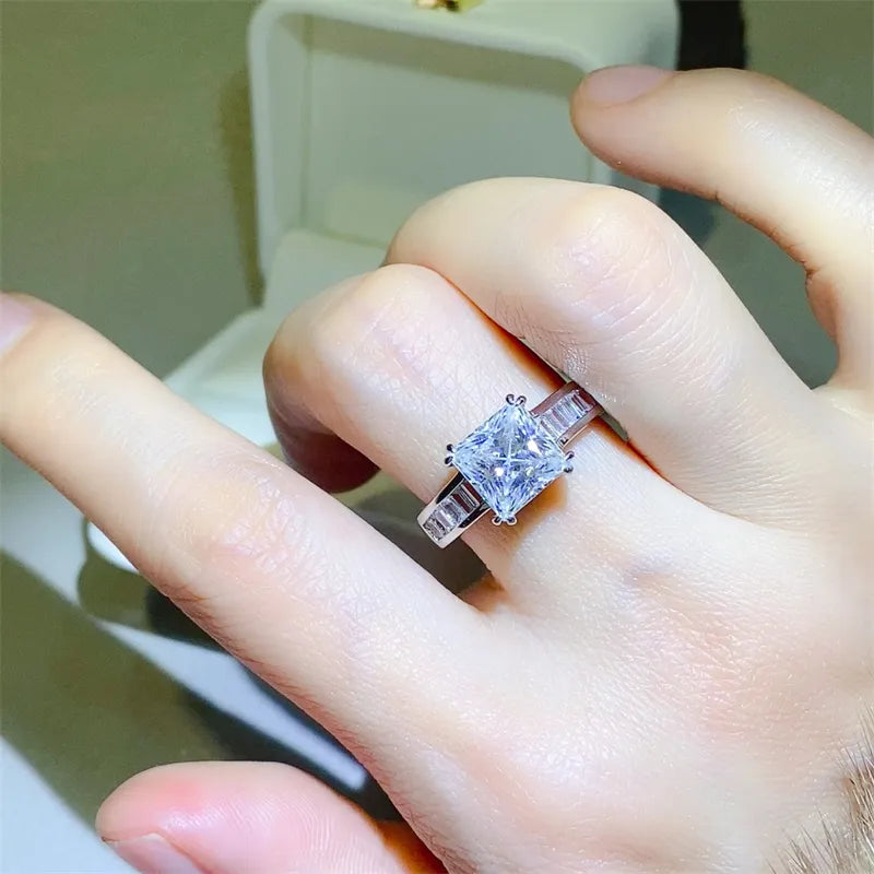 Aveline™ 3 carat princess cut moissanite ring with baguette side stones set in platinum-plated 925 sterling silver