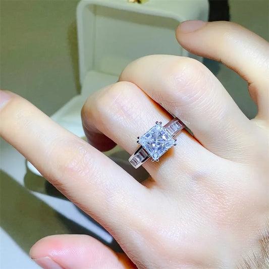 Aveline™ 3 carat princess cut moissanite ring with baguette side stones set in platinum-plated 925 sterling silver
