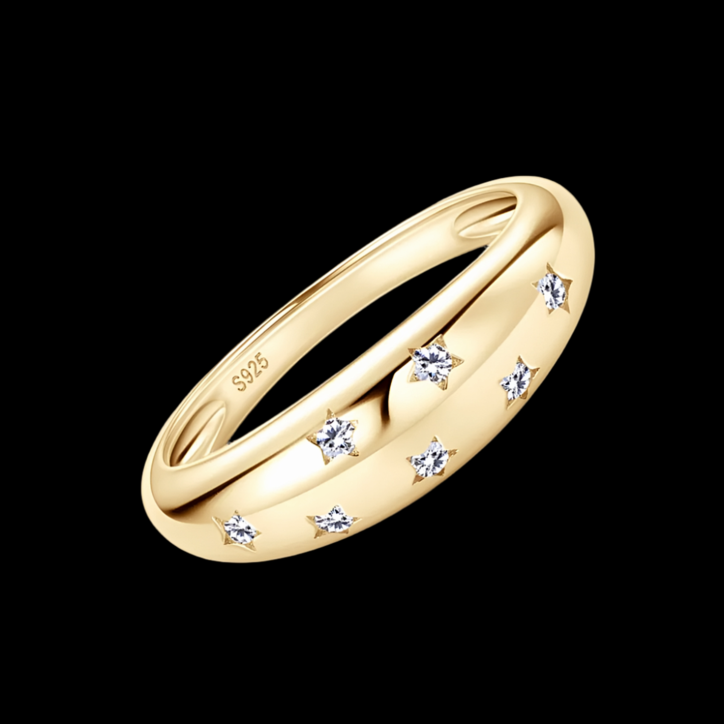 Gold ring with embedded diamonds on a black background