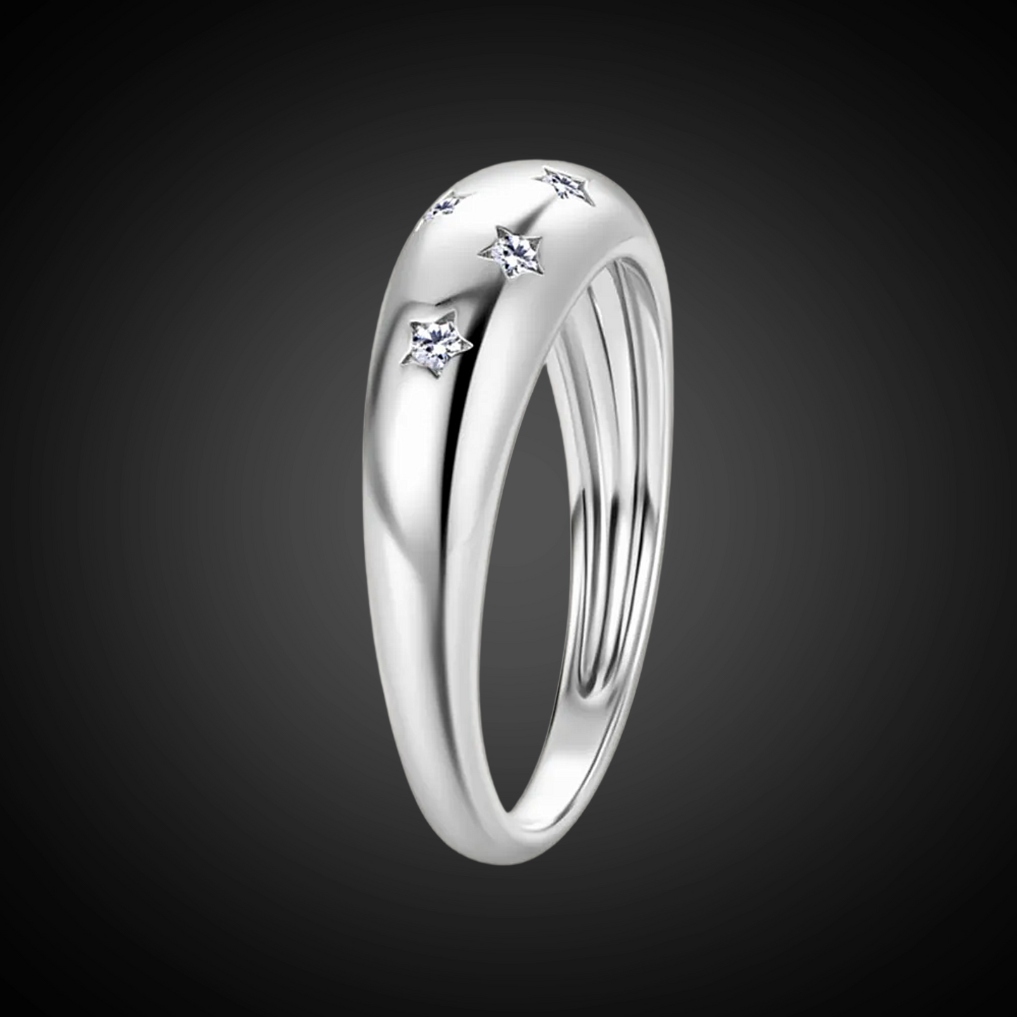 Silver ring with small diamonds on a dark background
