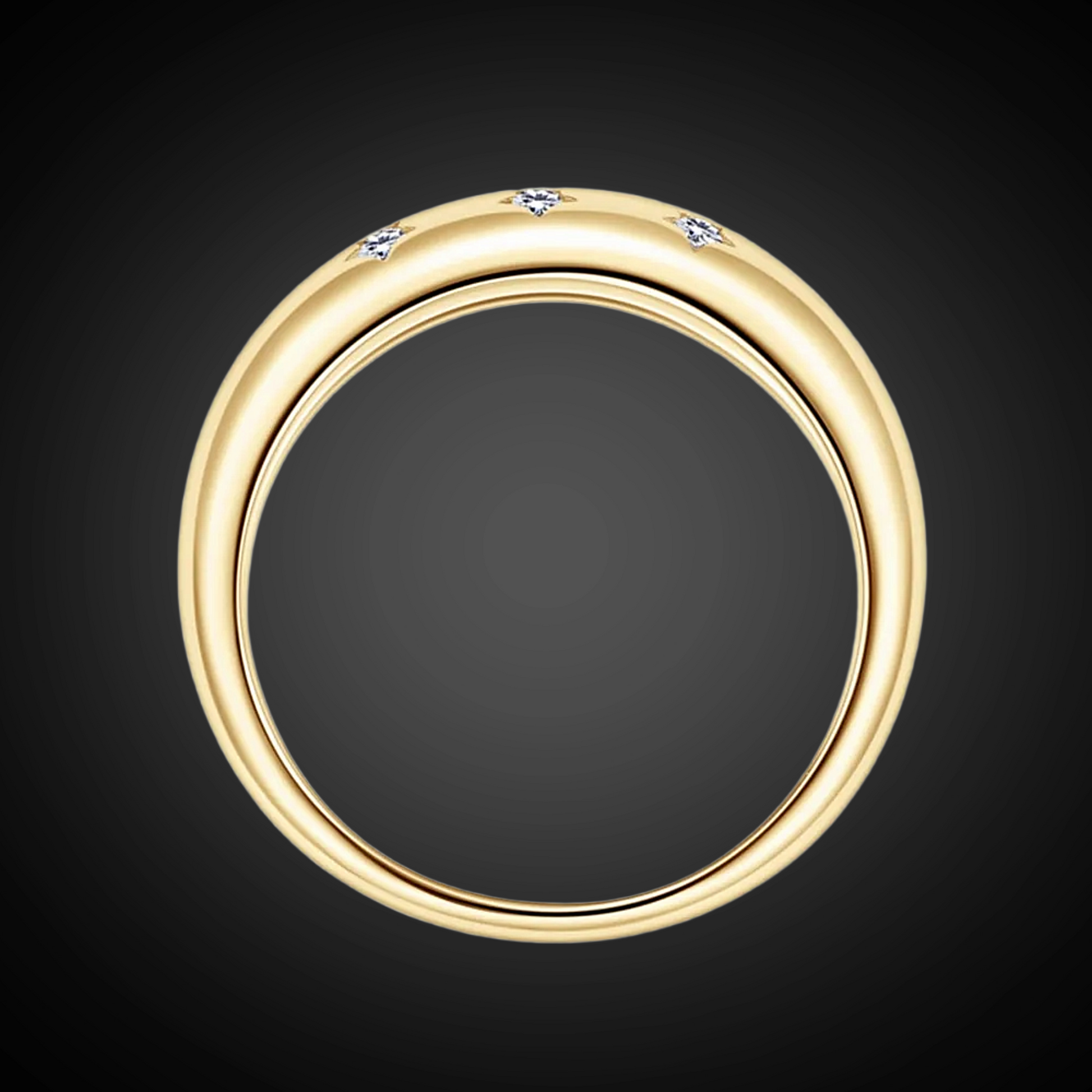 Gold ring with small diamonds on a black background