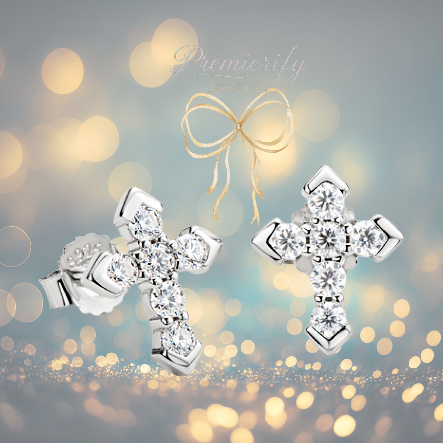 Silver cross earrings with clear gemstones on a blurred bokeh background with a gold bow.