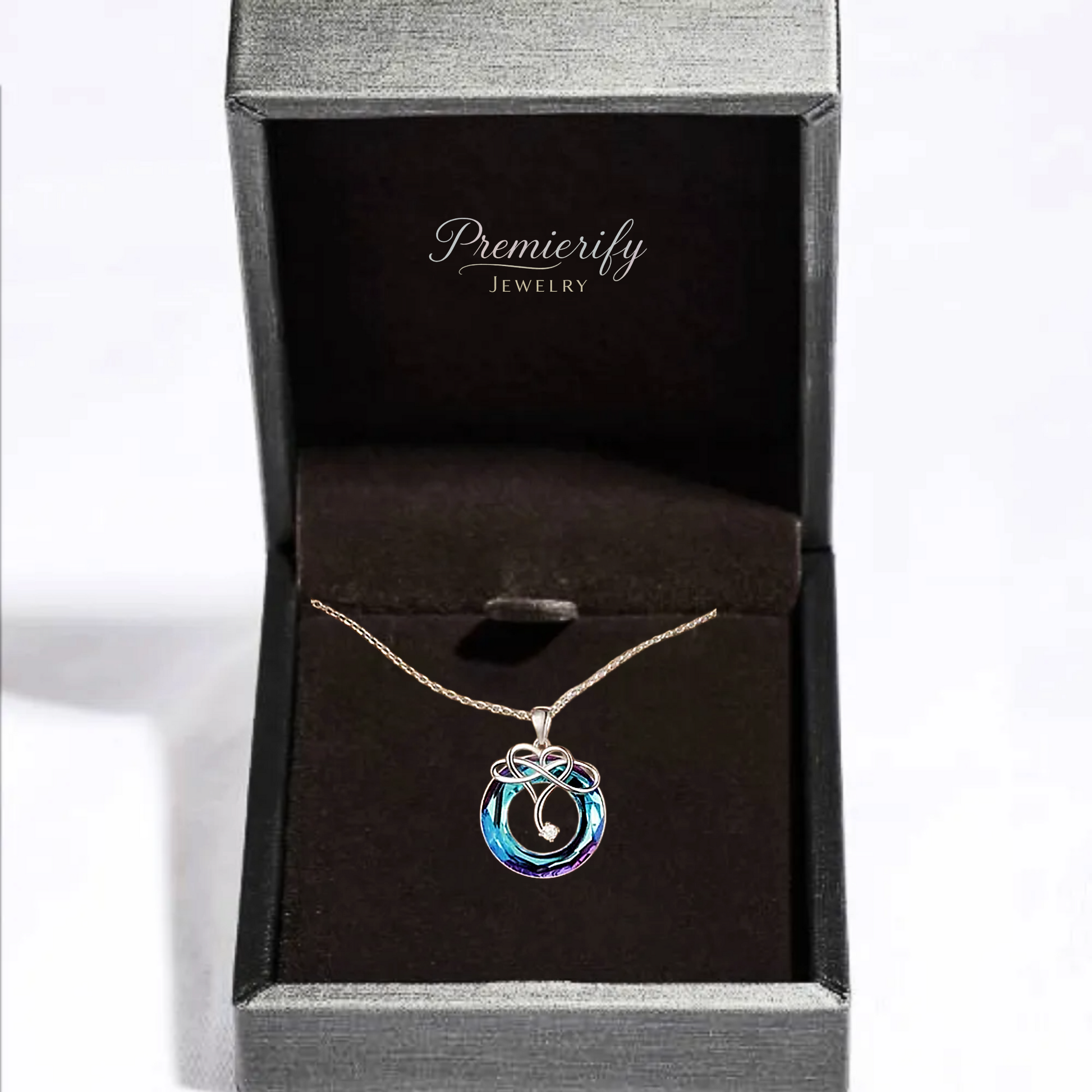 Necklace with a blue pendant in a 'Premierify Jewelry' box