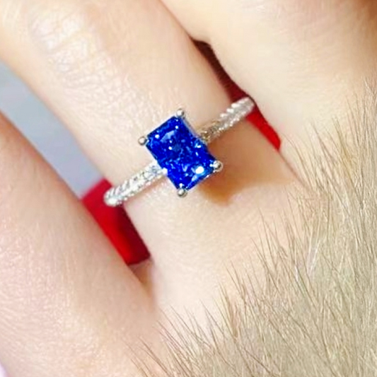 Cyanne™ 1 Carat Emerald-Cut Blue Moissanite Platinum Plated 925 Silver Ring