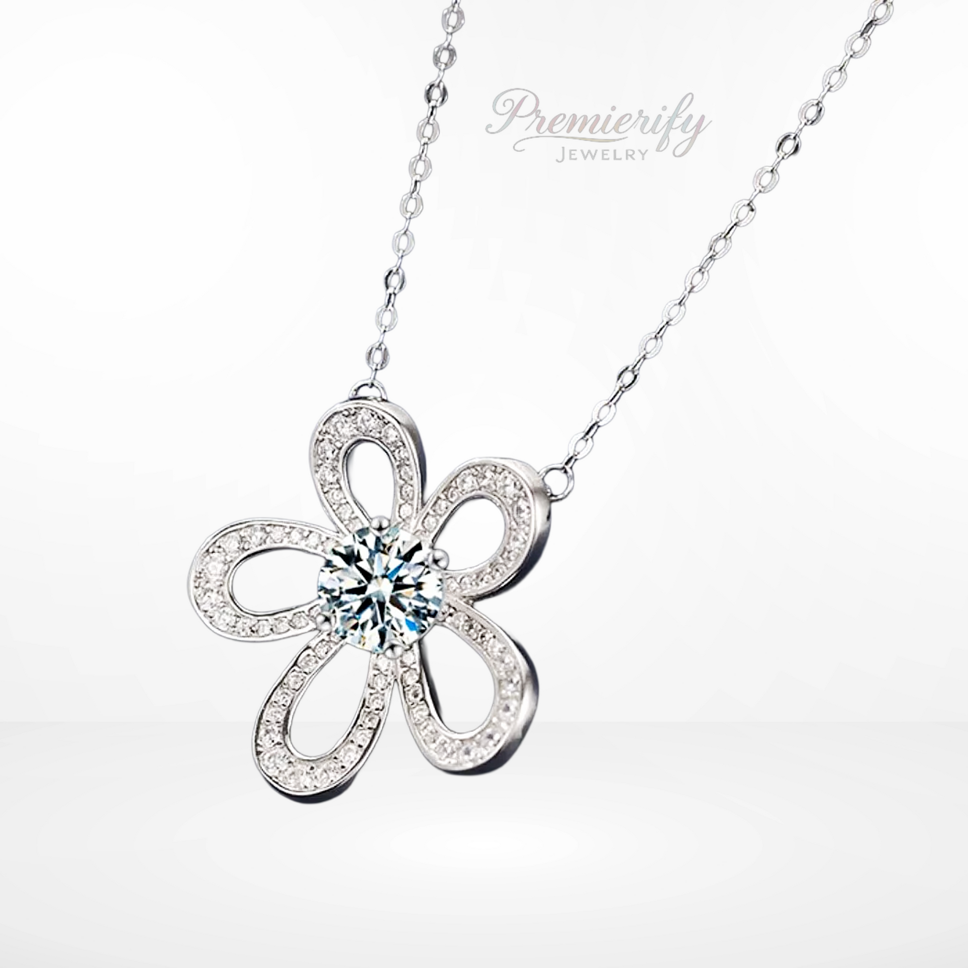 Silver flower-shaped necklace with a central gemstone on a white background, branded 'Premierify Jewelry'.