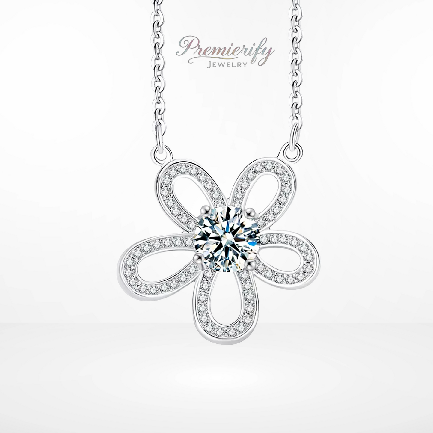 Silver flower-shaped necklace with a central gemstone on a white background, branded 'Premierify Jewelry'.