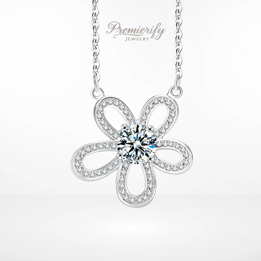 Silver flower-shaped necklace with a central gemstone on a white background, branded 'Premierify Jewelry'.