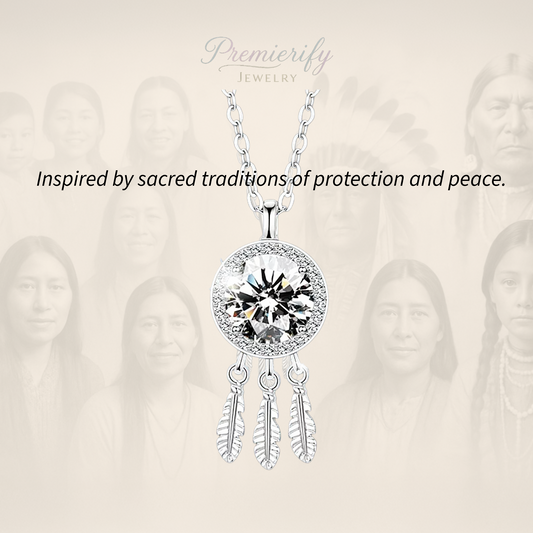 Silver necklace with a large gemstone and feather designs on a beige background with blurred faces.