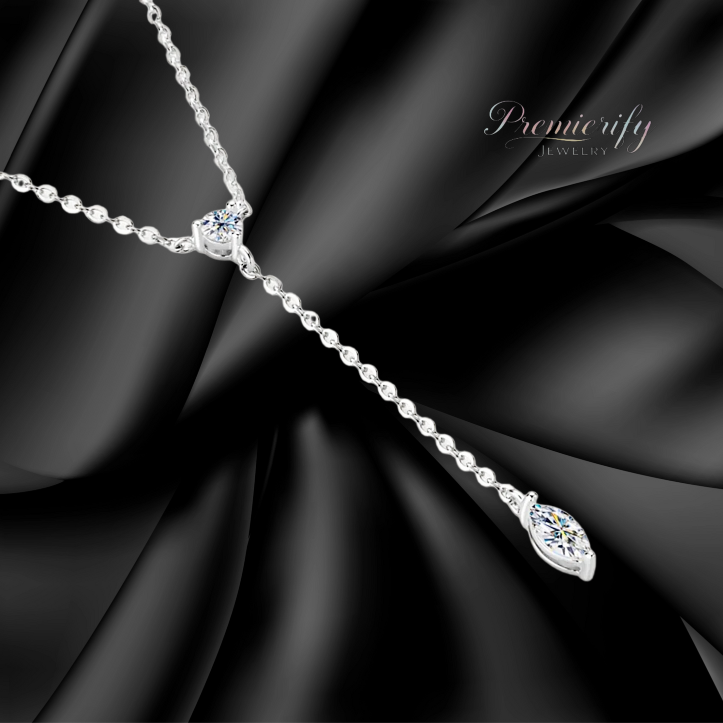 Silver necklace with a pendant on a black fabric background, featuring the brand 'Premierify'.