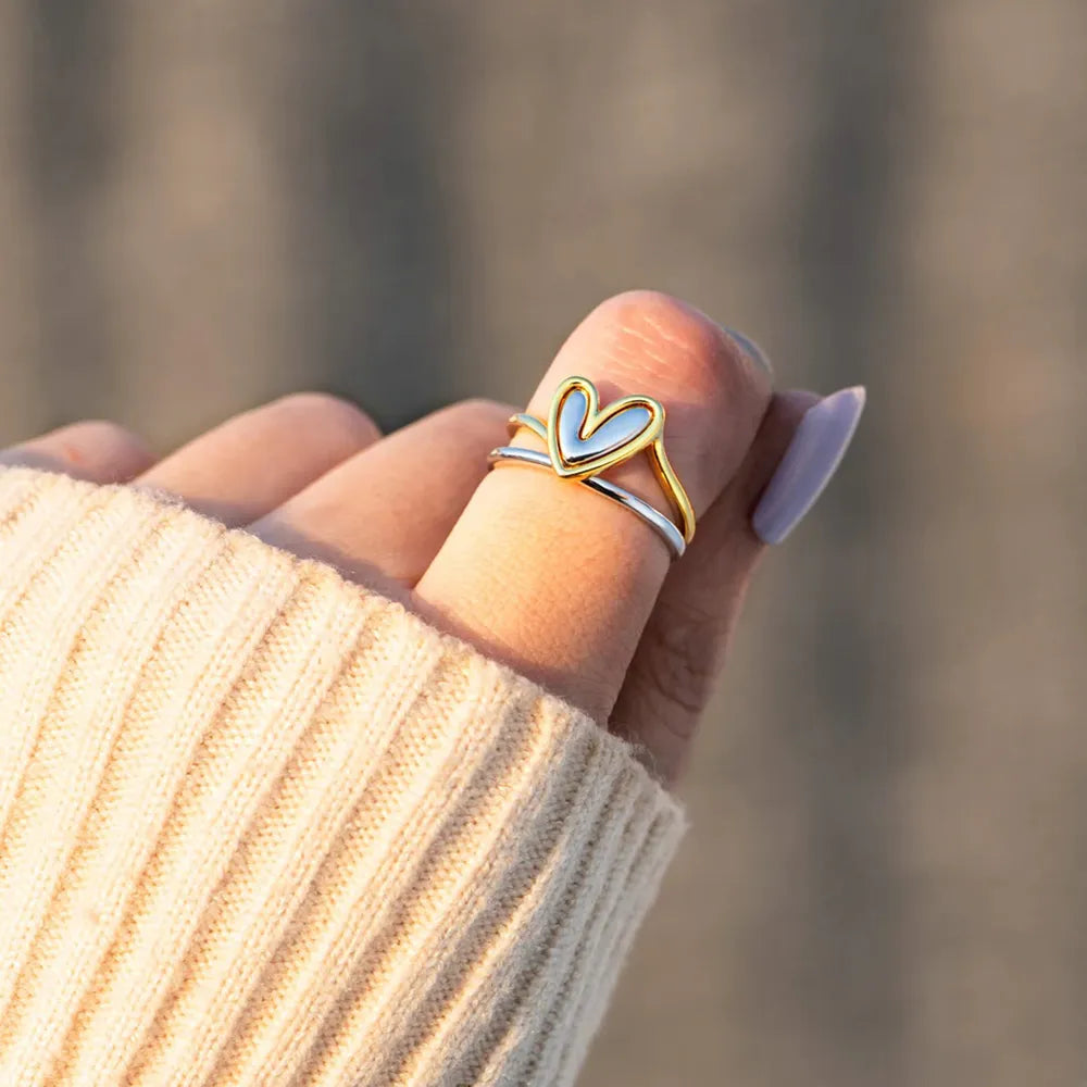 Vibe Heart™ asymmetric open-heart double-band ring in 925 sterling silver.