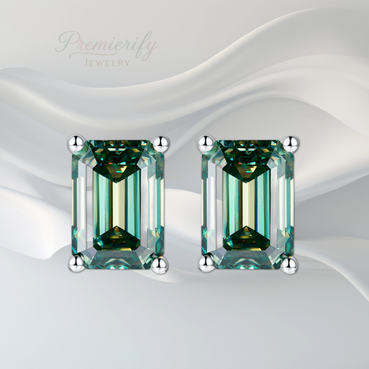 Pair of emerald-cut green gemstone earrings on a white background with 'Premierify Jewelry' branding.