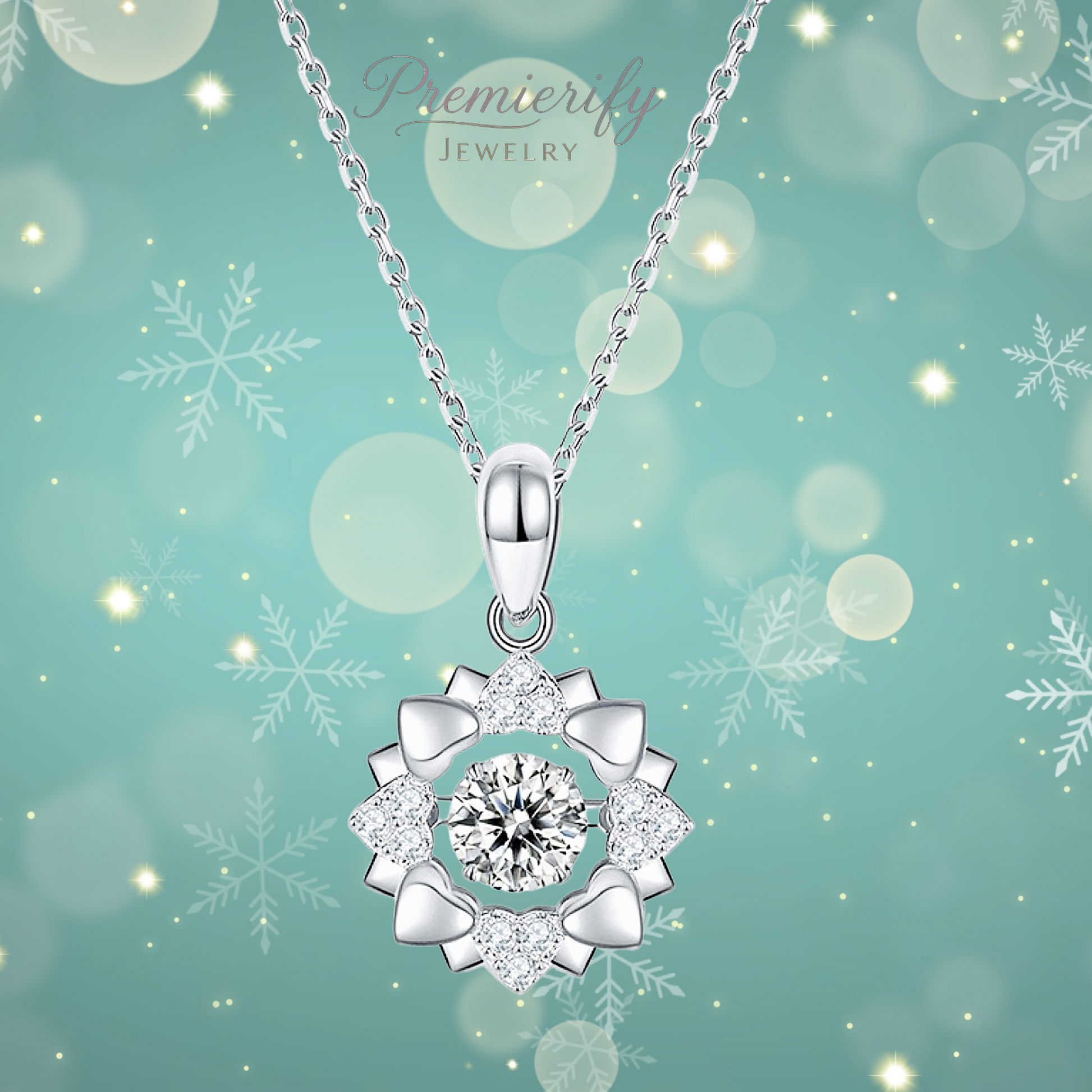 Silver flower and heart pendant necklace on a teal background with snowflakes