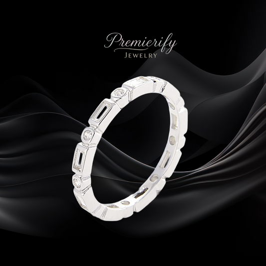 Silver ring with embedded stones on a black fabric background, featuring the 'Premierify Jewelry' brand.